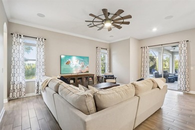 Perfectly positioned on a premium conservation homesite with on ChampionsGate Golf Resort in Florida - for sale on GolfHomes.com, golf home, golf lot