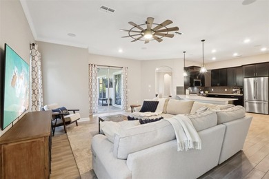 Perfectly positioned on a premium conservation homesite with on ChampionsGate Golf Resort in Florida - for sale on GolfHomes.com, golf home, golf lot