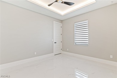 Welcome to a stunning new construction home perfectly positioned on Royal Tee Country Club in Florida - for sale on GolfHomes.com, golf home, golf lot