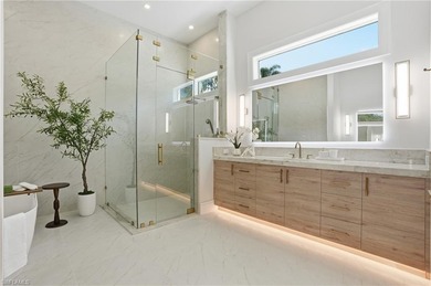 This coastal contemporary located exactly 1 mile to the beach in on Hole in the Wall Golf Club in Florida - for sale on GolfHomes.com, golf home, golf lot