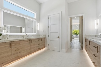 This coastal contemporary located exactly 1 mile to the beach in on Hole in the Wall Golf Club in Florida - for sale on GolfHomes.com, golf home, golf lot