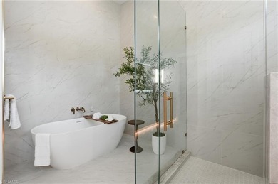 This coastal contemporary located exactly 1 mile to the beach in on Hole in the Wall Golf Club in Florida - for sale on GolfHomes.com, golf home, golf lot