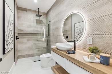 Welcome to a stunning new construction home perfectly positioned on Royal Tee Country Club in Florida - for sale on GolfHomes.com, golf home, golf lot