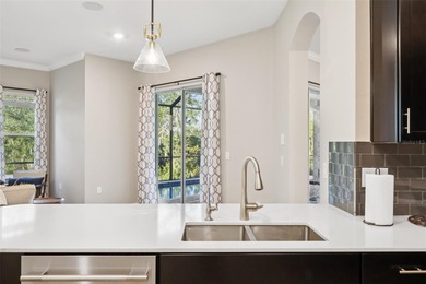 Perfectly positioned on a premium conservation homesite with on ChampionsGate Golf Resort in Florida - for sale on GolfHomes.com, golf home, golf lot