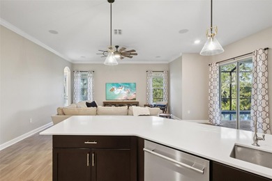 Perfectly positioned on a premium conservation homesite with on ChampionsGate Golf Resort in Florida - for sale on GolfHomes.com, golf home, golf lot