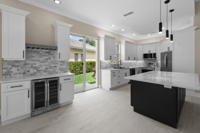 Stunning remodeled Oakmont in The Retreat with preserve views on Lost Lake Golf Club in Florida - for sale on GolfHomes.com, golf home, golf lot