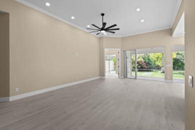 Stunning remodeled Oakmont in The Retreat with preserve views on Lost Lake Golf Club in Florida - for sale on GolfHomes.com, golf home, golf lot