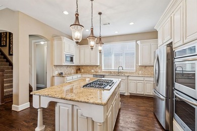 Step into luxury with this pristine custom Highland home on The Golf Club At Twin Creeks in Texas - for sale on GolfHomes.com, golf home, golf lot