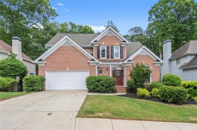Experience refined living at 1010 Graystone Crossing, nestled in on The Golf Club of Georgia in Georgia - for sale on GolfHomes.com, golf home, golf lot