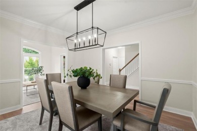 Experience refined living at 1010 Graystone Crossing, nestled in on The Golf Club of Georgia in Georgia - for sale on GolfHomes.com, golf home, golf lot