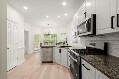 Experience refined living at 1010 Graystone Crossing, nestled in on The Golf Club of Georgia in Georgia - for sale on GolfHomes.com, golf home, golf lot