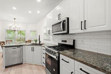 Experience refined living at 1010 Graystone Crossing, nestled in on The Golf Club of Georgia in Georgia - for sale on GolfHomes.com, golf home, golf lot