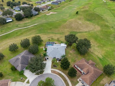 Exquisite 3 Bedroom, 3 Bathroom Pool Home Overlooking The Golf on Sherman Hills Golf Club in Florida - for sale on GolfHomes.com, golf home, golf lot