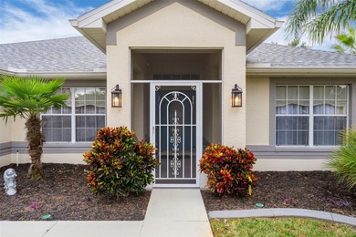 Exquisite 3 Bedroom, 3 Bathroom Pool Home Overlooking The Golf on Sherman Hills Golf Club in Florida - for sale on GolfHomes.com, golf home, golf lot