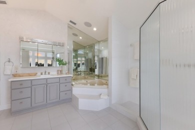 Experience the epitome of coastal elegance in this stunning on Key Royale Club in Florida - for sale on GolfHomes.com, golf home, golf lot