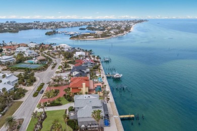 Experience the epitome of coastal elegance in this stunning on Key Royale Club in Florida - for sale on GolfHomes.com, golf home, golf lot