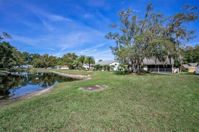 ENJOY THE POND & CONSERVATION VIEWS OF PEACE & TRANQUILITY IN on Summertree Golf Course in Florida - for sale on GolfHomes.com, golf home, golf lot