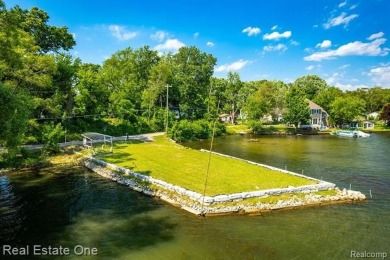 Build Your Dream Home!! On This Beautiful Peninsula Lake Front on Highland Hills Golf Course in Michigan - for sale on GolfHomes.com, golf home, golf lot