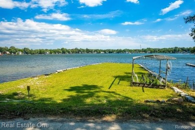 Build Your Dream Home!! On This Beautiful Peninsula Lake Front on Highland Hills Golf Course in Michigan - for sale on GolfHomes.com, golf home, golf lot