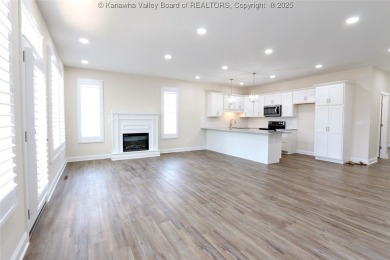 Stunning new construction home with a bright open layout with on Little Creek Country Club in West Virginia - for sale on GolfHomes.com, golf home, golf lot