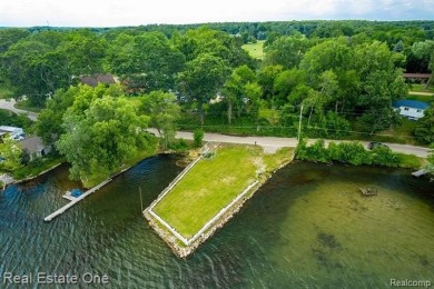 Build Your Dream Home!! On This Beautiful Peninsula Lake Front on Highland Hills Golf Course in Michigan - for sale on GolfHomes.com, golf home, golf lot