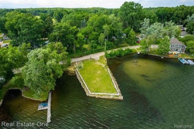 Build Your Dream Home!! On This Beautiful Peninsula Lake Front on Highland Hills Golf Course in Michigan - for sale on GolfHomes.com, golf home, golf lot