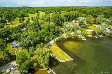 Build Your Dream Home!! On This Beautiful Peninsula Lake Front on Highland Hills Golf Course in Michigan - for sale on GolfHomes.com, golf home, golf lot