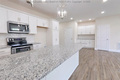 Stunning new construction home with a bright open layout with on Little Creek Country Club in West Virginia - for sale on GolfHomes.com, golf home, golf lot