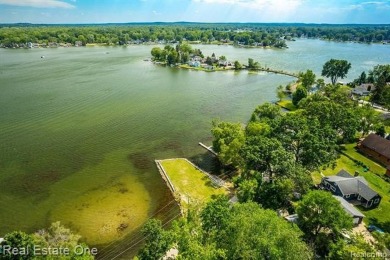 Build Your Dream Home!! On This Beautiful Peninsula Lake Front on Highland Hills Golf Course in Michigan - for sale on GolfHomes.com, golf home, golf lot