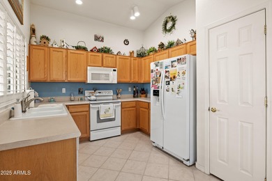 Welcome to this beautifully maintained 2 bedroom, 2 bath + Den on Lone Tree Golf Club in Arizona - for sale on GolfHomes.com, golf home, golf lot