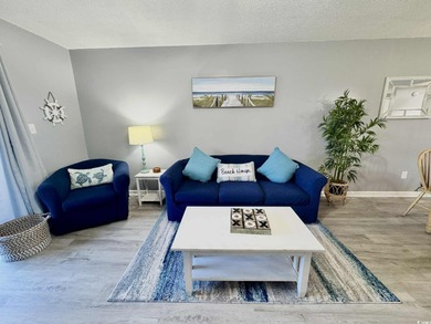 Welcome to coastal living at its best in this 2-bedroom, 2-bath on The Dunes Golf and Beach Club in South Carolina - for sale on GolfHomes.com, golf home, golf lot