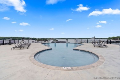 Lakefront retreat on the 13mm of the Lake of the Ozarks, where on Seasons Ridge At Four Seasons in Missouri - for sale on GolfHomes.com, golf home, golf lot
