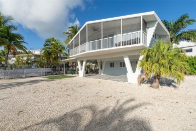Welcome to this beautifully elevated 2-bedroom, 2-bathroom on  in Florida - for sale on GolfHomes.com, golf home, golf lot