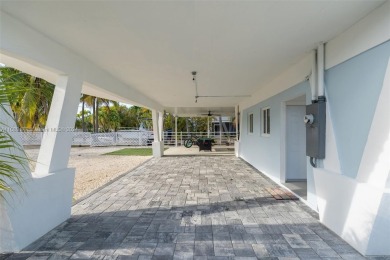 Welcome to this beautifully elevated 2-bedroom, 2-bathroom on  in Florida - for sale on GolfHomes.com, golf home, golf lot