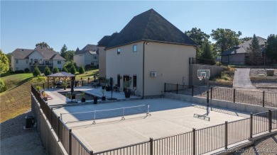 Welcome to a one-of-a-kind luxury estate in a gated Osage Beach on Sycamore Creek Golf Club in Missouri - for sale on GolfHomes.com, golf home, golf lot