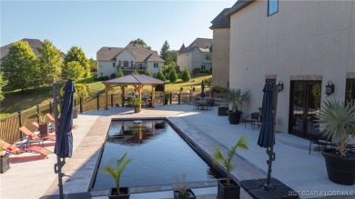 Welcome to a one-of-a-kind luxury estate in a gated Osage Beach on Sycamore Creek Golf Club in Missouri - for sale on GolfHomes.com, golf home, golf lot