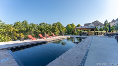 Welcome to a one-of-a-kind luxury estate in a gated Osage Beach on Sycamore Creek Golf Club in Missouri - for sale on GolfHomes.com, golf home, golf lot