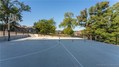 Welcome to a one-of-a-kind luxury estate in a gated Osage Beach on Sycamore Creek Golf Club in Missouri - for sale on GolfHomes.com, golf home, golf lot