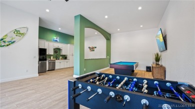 Welcome to a one-of-a-kind luxury estate in a gated Osage Beach on Sycamore Creek Golf Club in Missouri - for sale on GolfHomes.com, golf home, golf lot