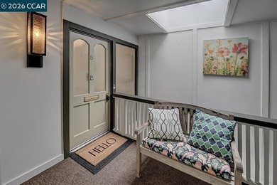 This home offers a peaceful retreat with abundant light and a on Rossmoor Golf Course in California - for sale on GolfHomes.com, golf home, golf lot