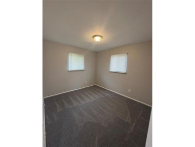 This charming and updated 2-bedroom, 1-bath ranch is move-in on The Links At Crystal Lake in Michigan - for sale on GolfHomes.com, golf home, golf lot