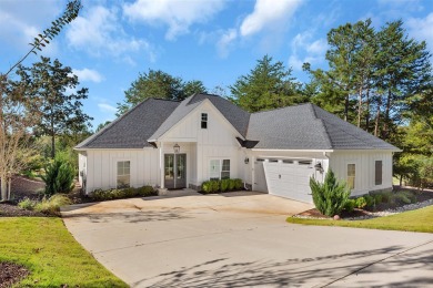 Welcome to 69 Coneflower Lane where this Craftsman style home for sale on GolfHomes.com