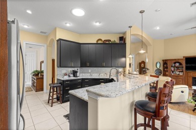 Nestled in the gated Harbor Hills community, this home offers a on Harbor Hills Country Club in Florida - for sale on GolfHomes.com, golf home, golf lot