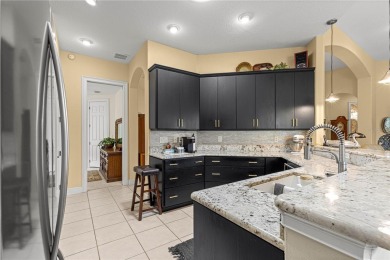 Nestled in the gated Harbor Hills community, this home offers a on Harbor Hills Country Club in Florida - for sale on GolfHomes.com, golf home, golf lot