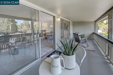 This home offers a peaceful retreat with abundant light and a on Rossmoor Golf Course in California - for sale on GolfHomes.com, golf home, golf lot