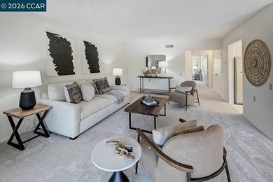 This home offers a peaceful retreat with abundant light and a on Rossmoor Golf Course in California - for sale on GolfHomes.com, golf home, golf lot