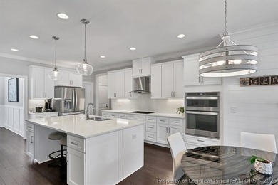 Set within a peaceful cul-de-sac in the prestigious gated on Anderson Creek Golf Club in North Carolina - for sale on GolfHomes.com, golf home, golf lot