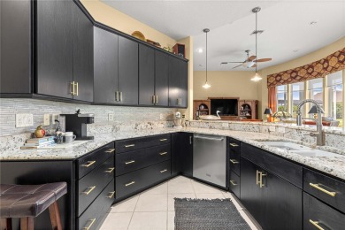 Nestled in the gated Harbor Hills community, this home offers a on Harbor Hills Country Club in Florida - for sale on GolfHomes.com, golf home, golf lot