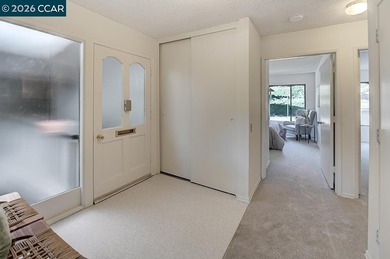 This home offers a peaceful retreat with abundant light and a on Rossmoor Golf Course in California - for sale on GolfHomes.com, golf home, golf lot