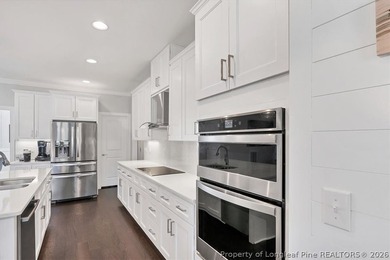 Set within a peaceful cul-de-sac in the prestigious gated on Anderson Creek Golf Club in North Carolina - for sale on GolfHomes.com, golf home, golf lot